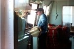 Pilot in Stern Pilot House of Lake Boat Badger